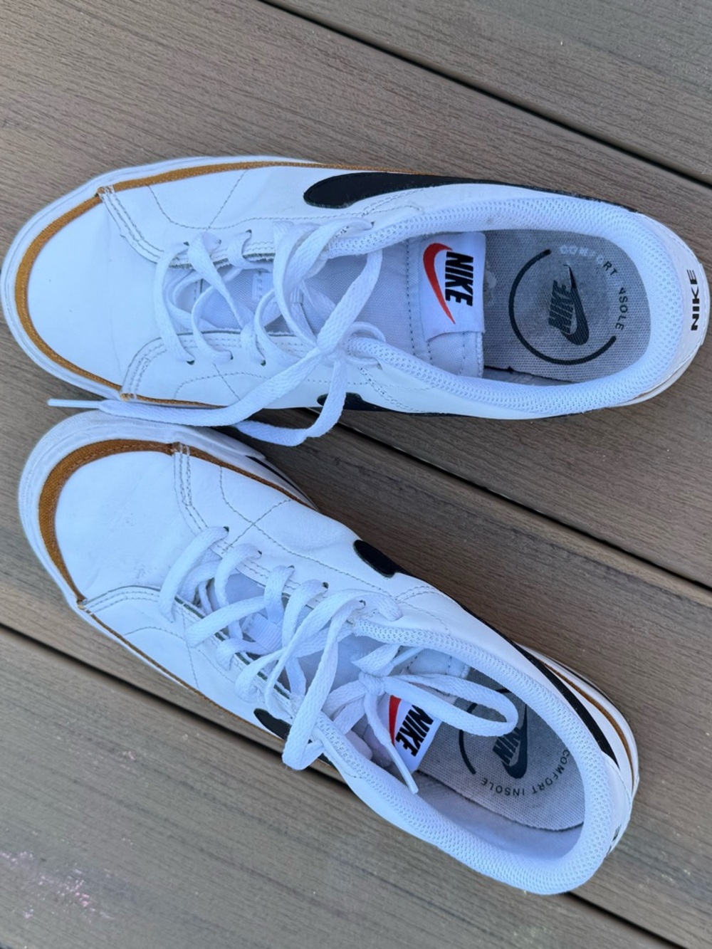 Nike White Sneakers with Black Swoosh and Tan Accents